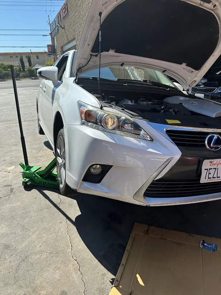White Lexus hybrid being serviced at Hybrid 310 in Hawthorne